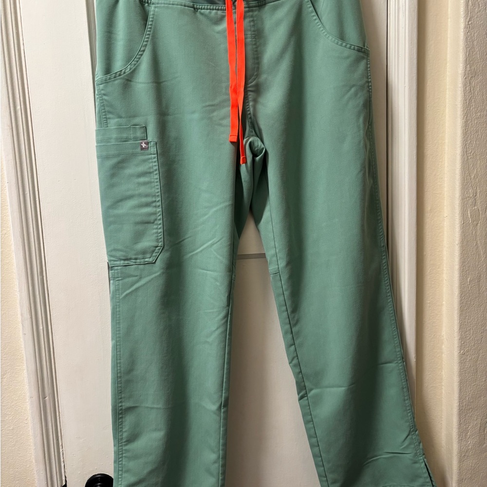 Women’s Figs Kade scrub pants surgical green with Orange Drawstring